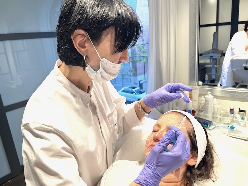 registered nurse performing dermal filler treatment at MedVSPA