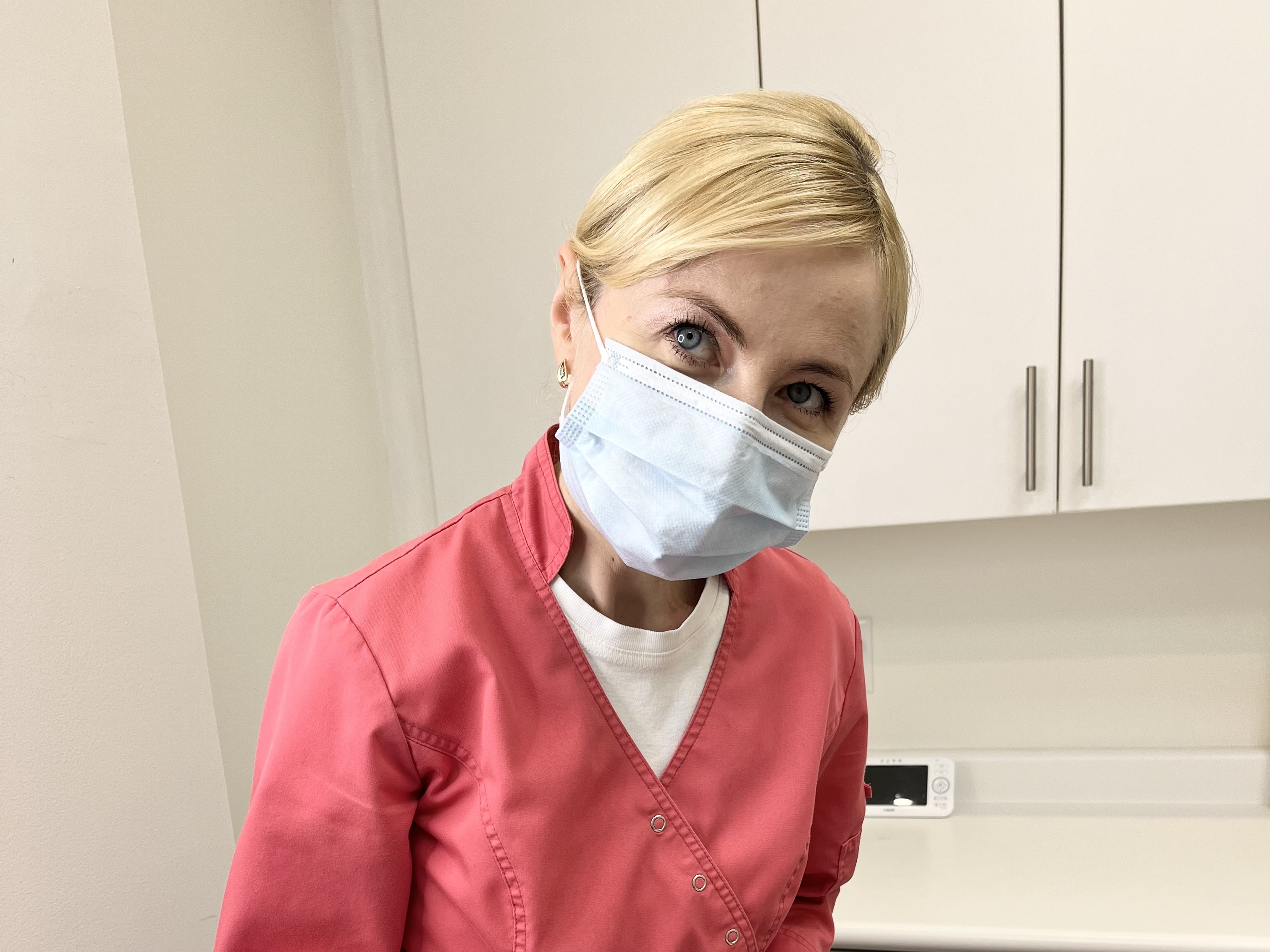 medical esthetitian preparing for the consultation