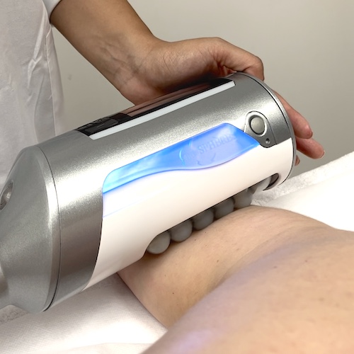 Close-up of Endosphères Therapy roller showing silicone spheres in motion